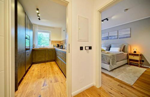 EDLER WOHNRAUM Luxuriöses Apartment mit Balkon, Boxspringbett, Kaffeevollautomat, Lift & Parkplatz - Foto 16