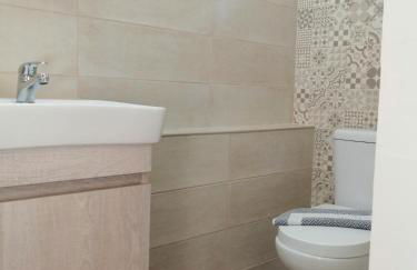 Marina's Apartments - White & Stone Apartment - Photo 24