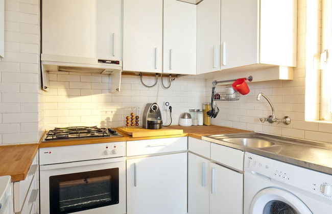 Prime Apartments White and Yellow - Photo 14