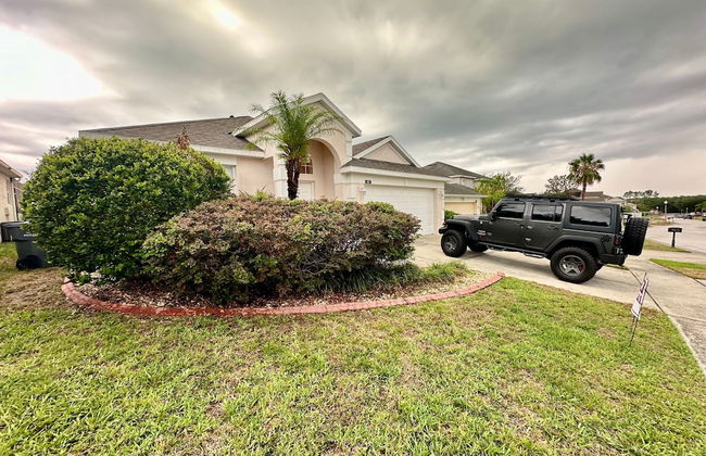 Grand Fabulous 4BR Pool Home Near Disney - Photo 1