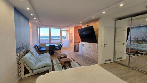 Moderne Wohnung mit Sonnenuntergang über dem Meer - Foto 3