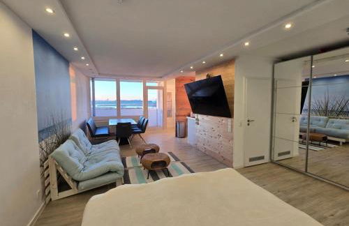 Moderne Wohnung mit Sonnenuntergang über dem Meer - Foto 3