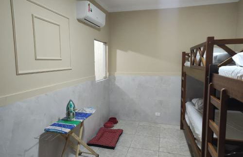 Casa para Famílias e Grupos com Ar-condicionado, Churrasqueira e estacionamento próximo em Praia Grande - Foto 35