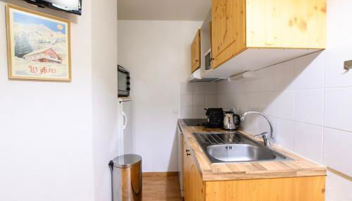 CozyLoge, Orelle & Les 3 vallées - Foto 5, stove, minibar