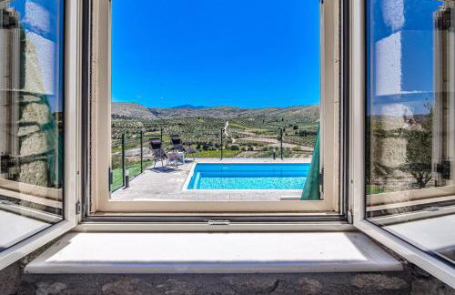 Elysian Stone Villa with Pool & Mountain View - Photo 28
