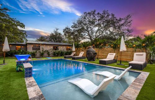 Bali Inspired home with Heated Pool, Sauna and Hot Tub! Close to Beach and Atlantic Ave - Photo 7