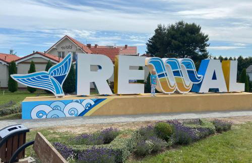 Domki przy plaży Owocowy Ogród - Photo 30