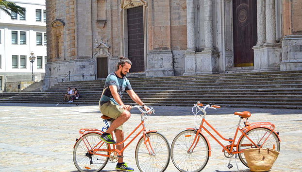Cycling in front of Cadiz Cathedral