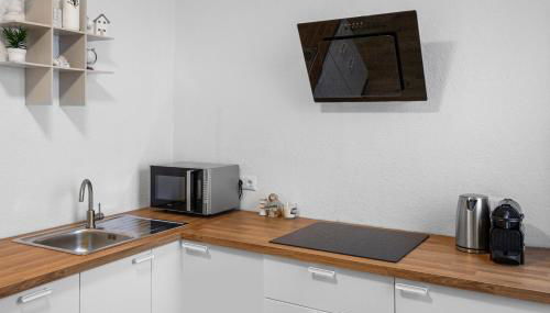 Stylisches City-Apartment - Photo 2, stove