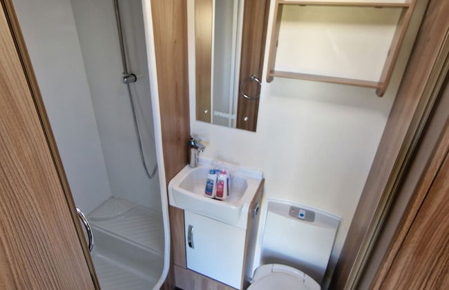 Brand new Touring Caravan Sited all Setup Ready - Photo 13