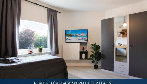 RtR Apartment Herne - Für 1 Person - Voll ausgestattet - Zentrum - Parken - Smart TV - WIFI - Modern - Foto 2, wardrobe