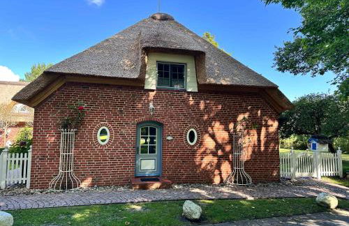 Sky & Sand Homes Sturmmöwe I Reetdach-Refugium mit Parkgarten in SPO - Photo 8
