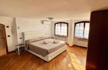 Appartamento mansardato con vista lago - Photo 6