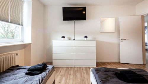 Work & Enjoy Apartments in Ahrensburg - Foto 2, towels, wardrobe