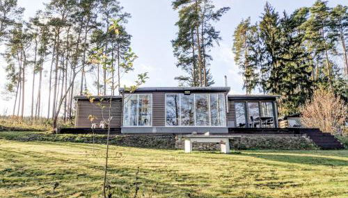 Ferienhaus direkt am See - Kamin, Klima, Sauna und Boot - Foto 4
