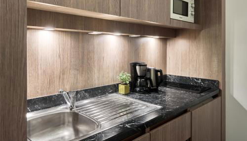 Zenitude Hôtel Résidences Roissy Village - Foto 4, stove