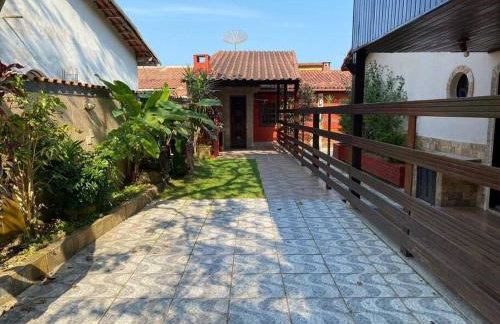 Ampla casa em condomínio a 300mt da praia - Foto 20