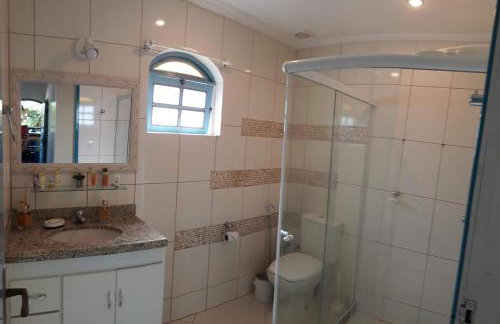 Casa com amplo quintal, churrasqueira e área verde - Foto 9