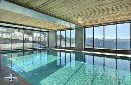 ARC 1600, LE RIDGE, Appartement 10 personnes Duplex Vue Montagne - ski aux pieds - Sauna, Hammam, Piscine, Salle de salle de sport-fitness - Foto 42