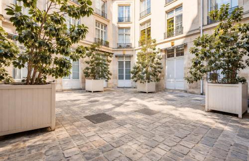 L’Écrin Sous les Toits – Coeur de Paris - Photo 12
