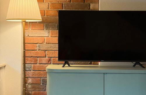 Holziges Dachgeschoss-Apartment - Foto 1