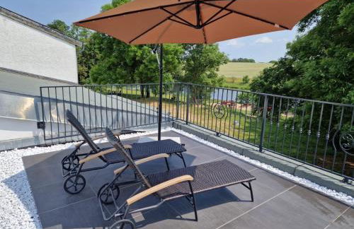 Ferienwohnung mit Kamin und traumhafter Dachterrasse mit Weitblick in die Natur - Foto 4