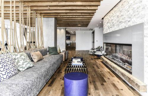 Comfy 2BR Oasis with Scenic Rooftop & Gym - Photo 27