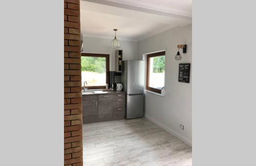 Caloroczny domek letniskowy ze stawem - Foto 30