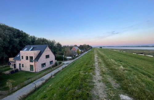 Deichkoje12 Deck 1 EG direkt am Eiderdeich nur 7 km bis zur Nordsee und 20 Min bis Sankt Peter Ording - Foto 25