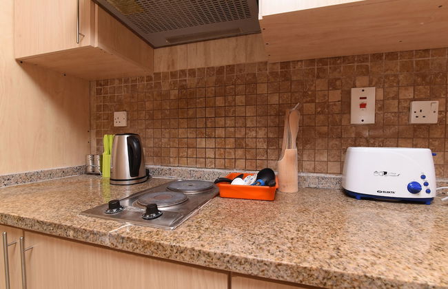 OYO Home 2351BHK Capitol Tower DIC - Photo 11