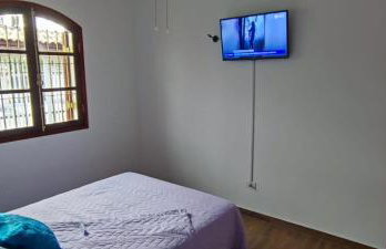 Casa Rosa de Peruíbe - Casa de Temporada 3 dormitórios, 10 hóspedes, piscina, wi-fi, netflix, 800 metros da praia - Photo 29