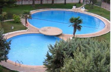 Acogedor apartamento en Daimús a 150 metros de la playa con parking privado y piscinas comunitarias - Foto 1