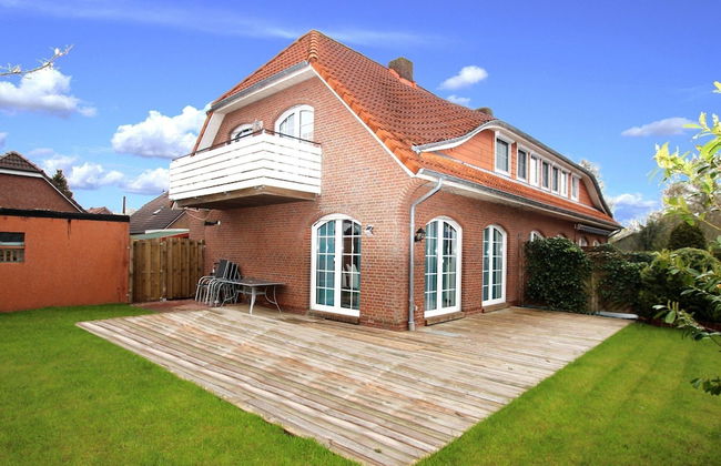 Ferienhaus in Dornum mit Garten - Foto 1