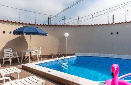 Casa Lindíssima e Espaçosa com 2 Piscinas - Adulto e Infantil, Perto da Praia, Opção da Piscina Adulto Aquecida Cobrado à Parte, 4 Quartos Frente as Piscinas, Área Gourmet Completa com Churrasqueira, Forno e Fogão a Lenha, Mesa de Bilhar, Lareira na Sala - Photo 10
