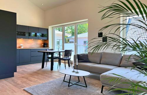 Haus Kiebitz 2 OG - Neubau-Apartment mit Infrarot-Sauna, Balkon & 600 m zum Strand - Foto 1