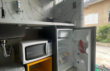 Adorável Tiny house 5, ar, cozinha completa, wifi e tv smart - Foto 7
