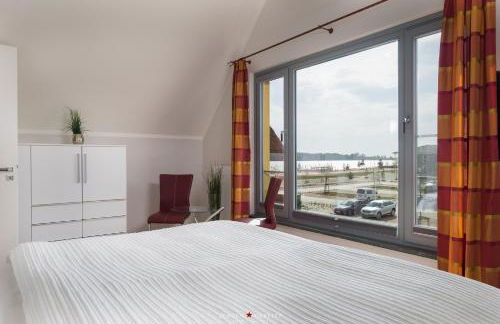 Ostsee - Reetdachhaus Nr 8 "Sonne und mehr" - mit Lademöglichkeit im Strand Resort - Foto 15