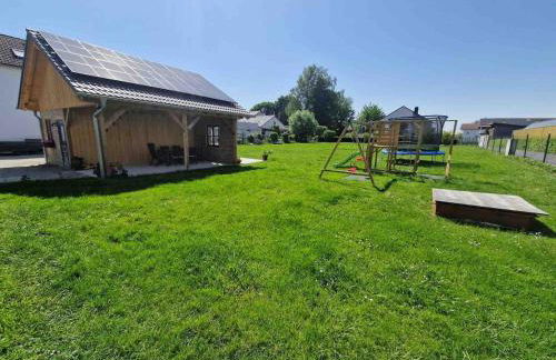 Neue moderne Ferienwohnung mit Infrarot Sauna und großen Garten - Foto 28