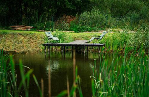 Domek na Mazurach nad stawem z jacuzzi - Photo 13