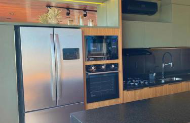 Apê a 450mt Praia da Vila - split, piscina com vista, BBQ e garagem coberta - Photo 22