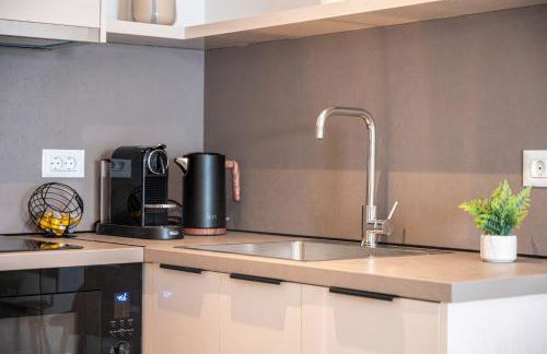 Unicos City Suites - Photo 44