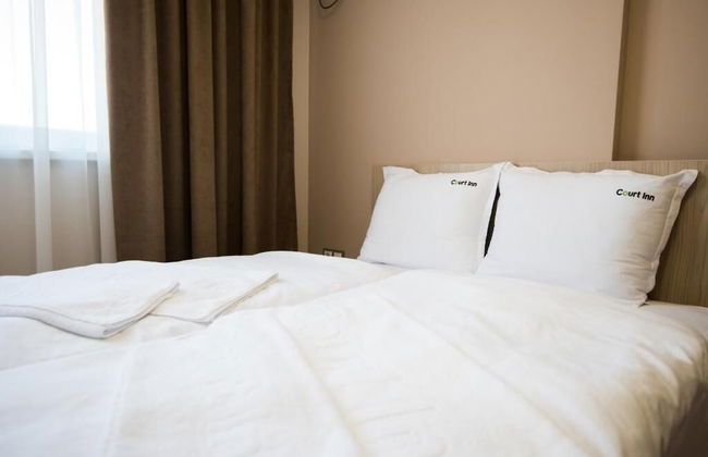 Court Inn - Foto 1