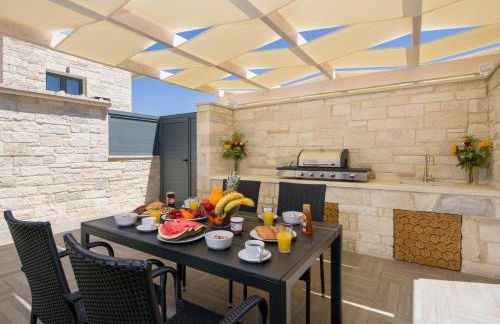 TWIN'S HOME LUXURY SUITES - Photo 27