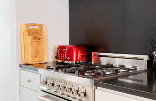 E10-2 Designer East Village Townhouse 1BR W D - Foto 24