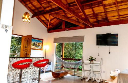 Chalé Canto do Galo 1 - Hidro da Jacuzzi, Lareira Ecológica, Cozinha Completa, Wi-Fi 80mbps, próximo a comércio local e relaxando ao som do riacho - Photo 31