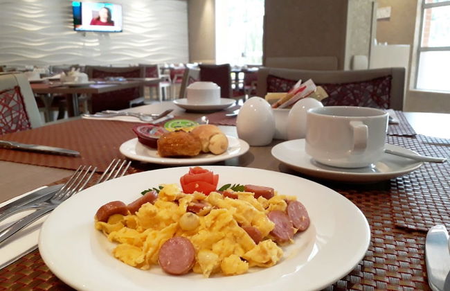 Hotel Plaza Suites - Photo 35