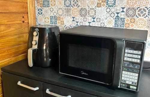 Chalé com PISCINA Privativa, com 2 QUARTOS, ESTACIONAMENTO em Condomínio com PORTARIA 24h, Sauna, Quadras, 3 PISCINAS no condomínio, Pesca e Parquinho Infantil - SmarTV na sala de estar, TV na área CHURRASQUEIRA, Wi-Fi e Cozinha Completa - Foto 30