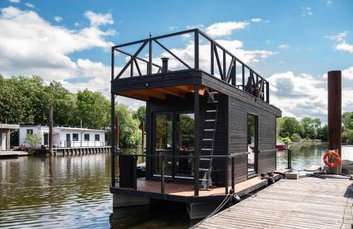 Tiny-Hausboot LIKEDEELER mit Dachterasse und Kamin - Foto 1