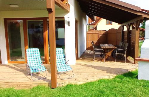 Dom z pięknymi widokami na jezioro ryńskie ilasy. - Foto 28