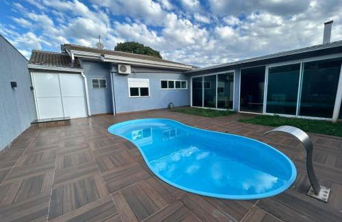 Casa com piscina próximo a BR 277 - Foto 1